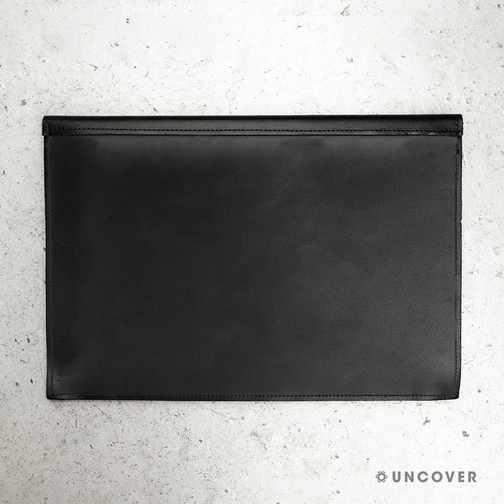 Rear black leather laptop sleeve