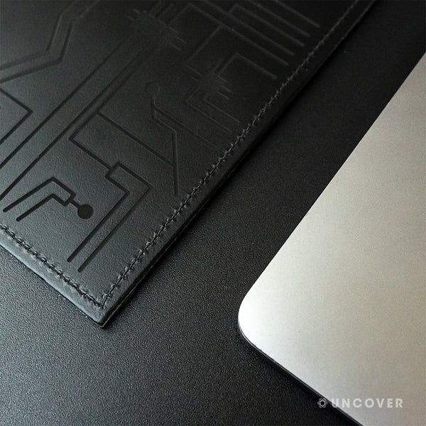 Laser engrave a design on your own black leather sleeve